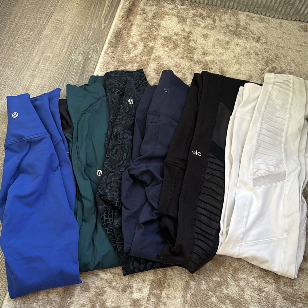 4 pairs of lululemon leggings and 2 pairs of Alo moto leggings